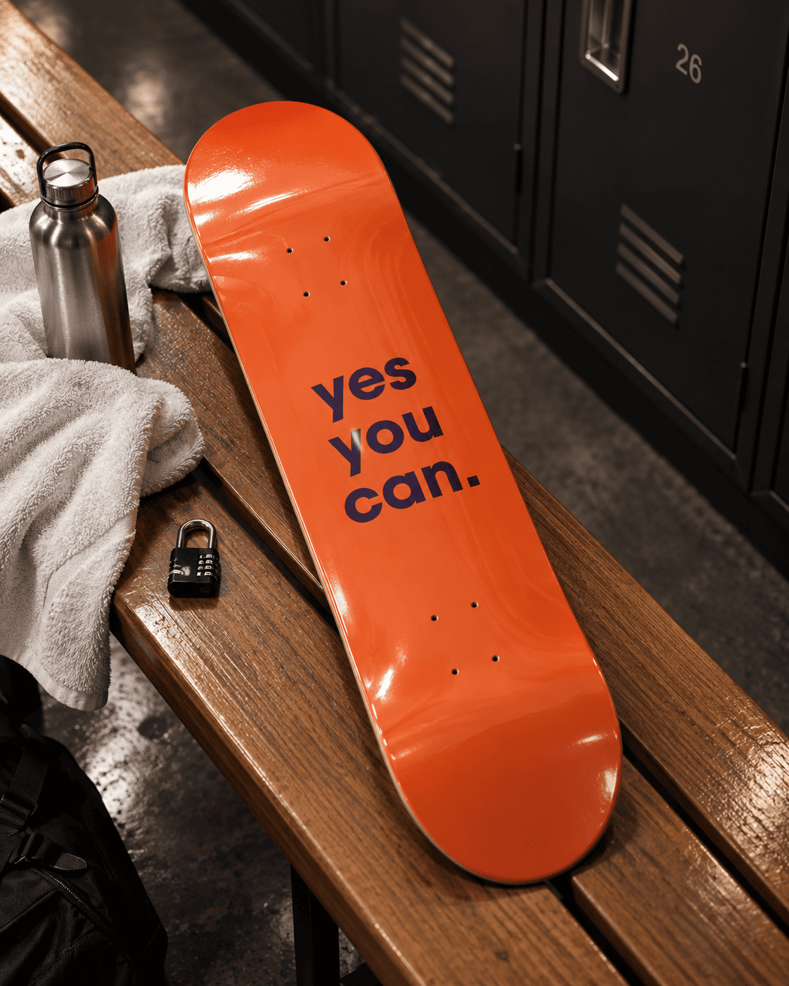 Yes You Can motivational typography skateboard wall art leaning against a mirror in a gym locker room