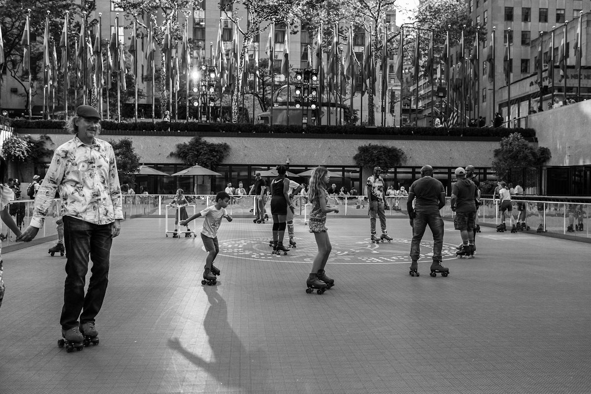 a group of people skating