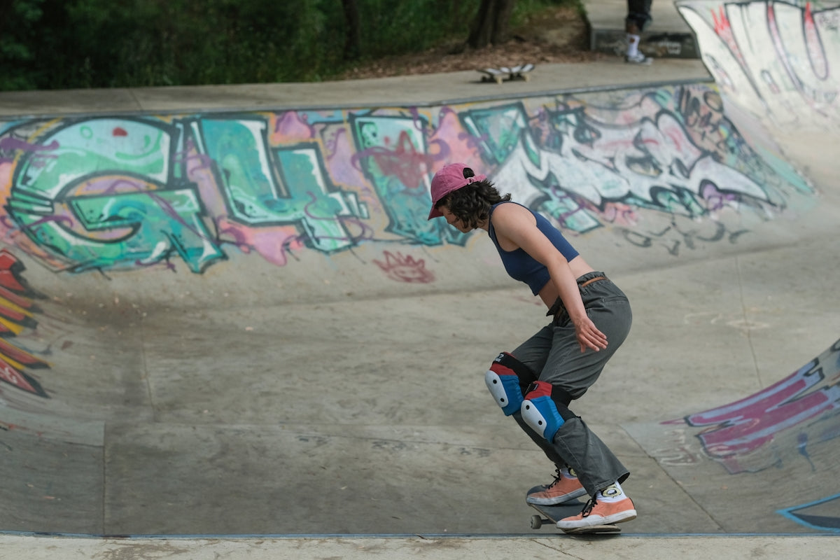 a person riding a skate board at a skate park